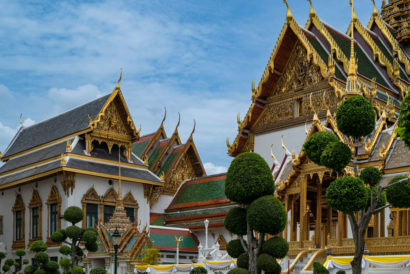 Grand Palace Bangkok with family visiting the ornate temple grounds