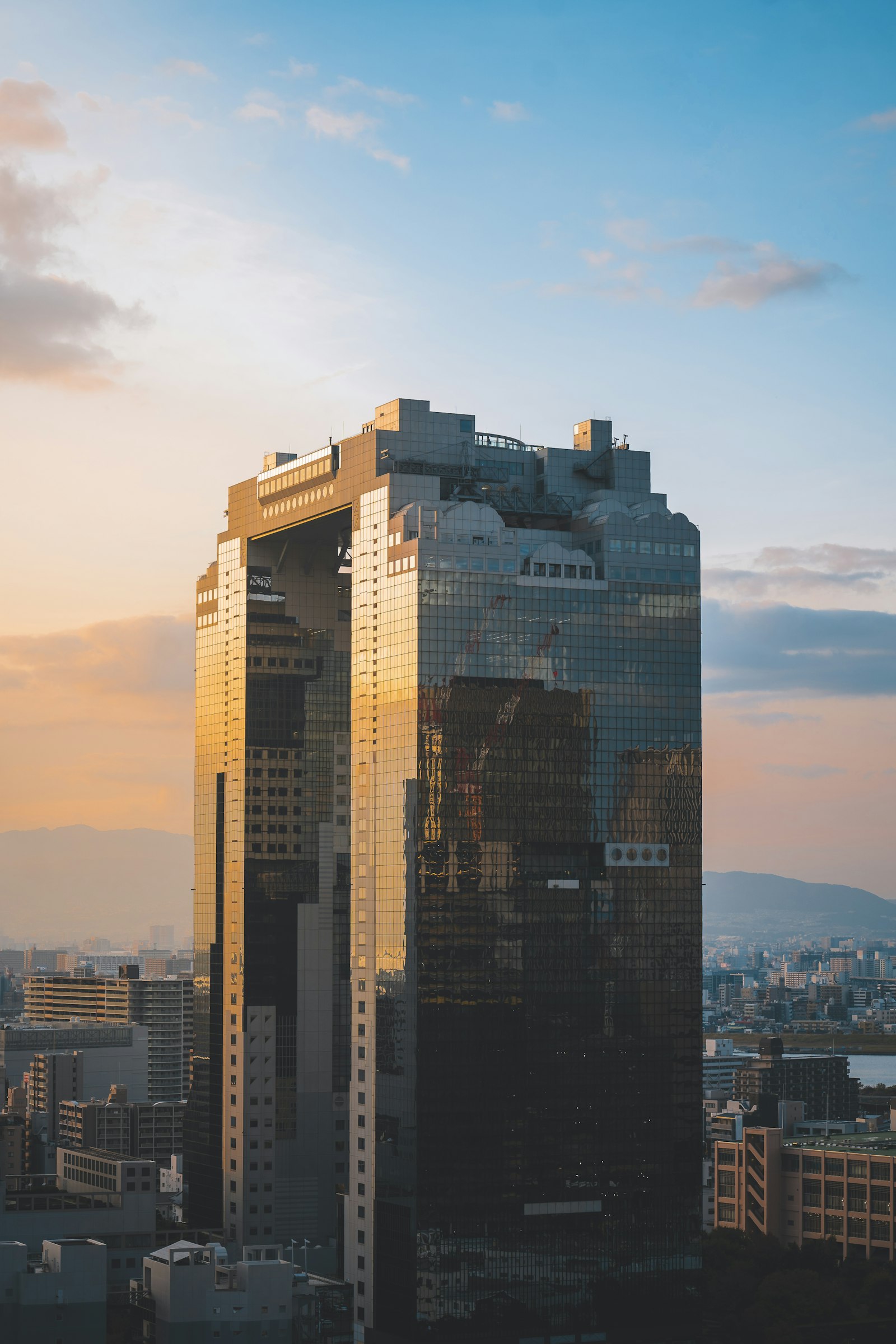 Couple admiring the sunset view from Umeda Sky Building's Floating Garden Observatory