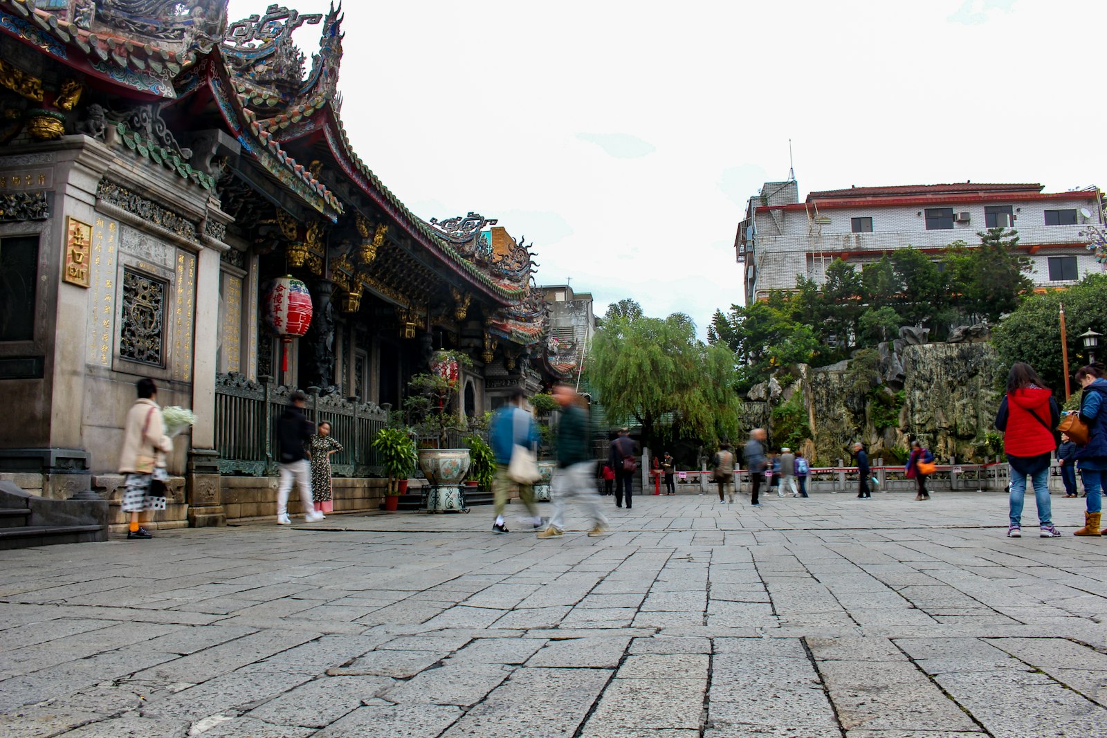 Incense smoke rising at Longshan Temple in Taipei